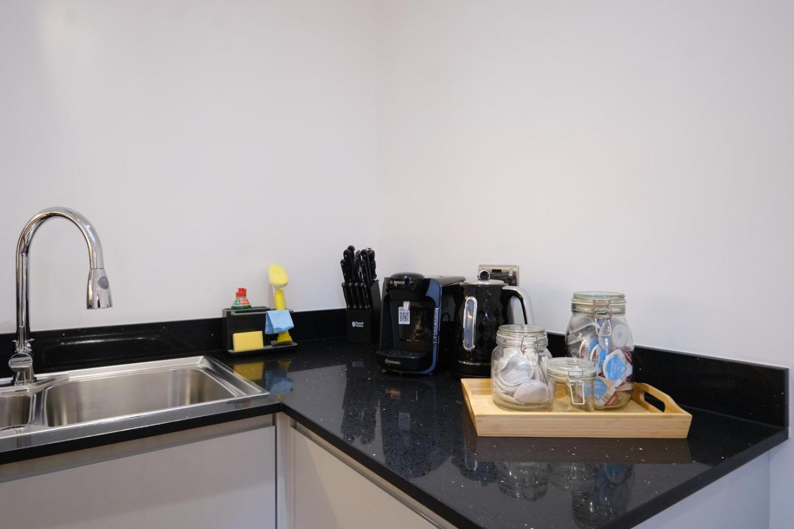Tv | Near Key Attractions | Quality Staycation Apartment