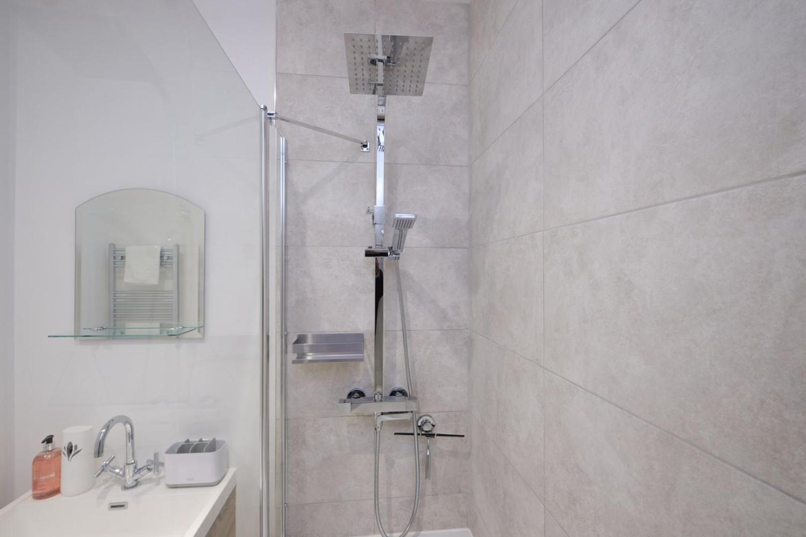 Tv | Near Key Attractions | Quality Staycation Apartment